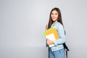 portrait-attractive-cute-young-student-girl-isolated-white-wall-scaled-1.jpg